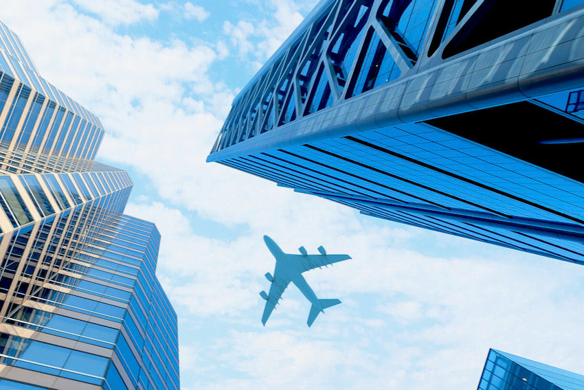 business travel aeroplane skyscrapers